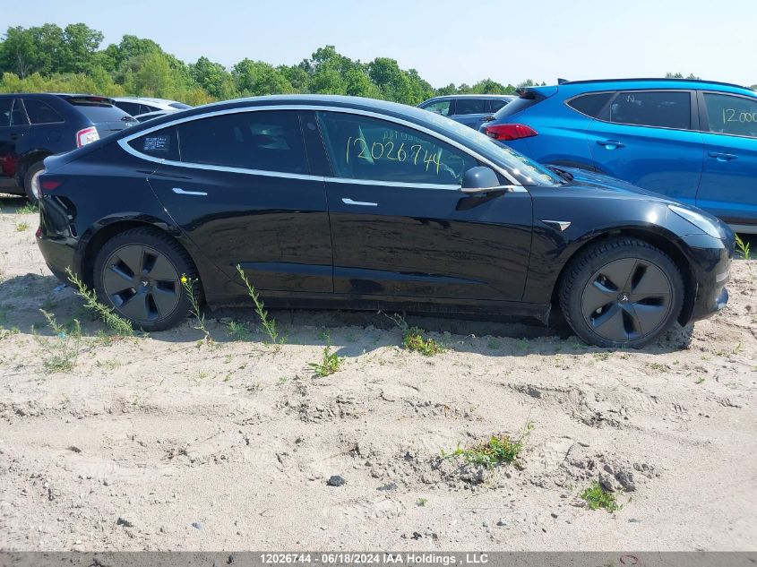2019 Tesla Model 3 VIN: 5YJ3E1EAXKF410427 Lot: 12026744