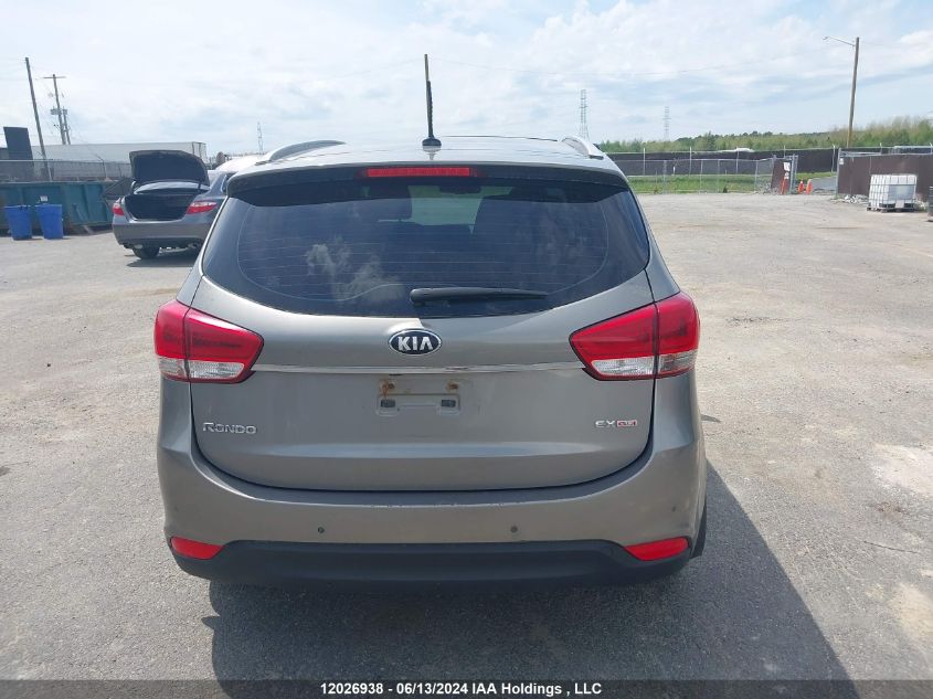 2014 Kia Rondo VIN: KNAHU8A34E7041693 Lot: 12026938