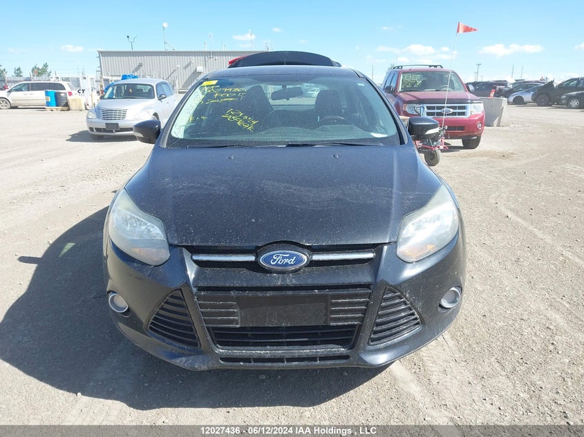 2014 Ford Focus Titanium VIN: 1FADP3J26EL242771 Lot: 12027436