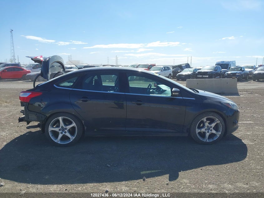 2014 Ford Focus Titanium VIN: 1FADP3J26EL242771 Lot: 12027436