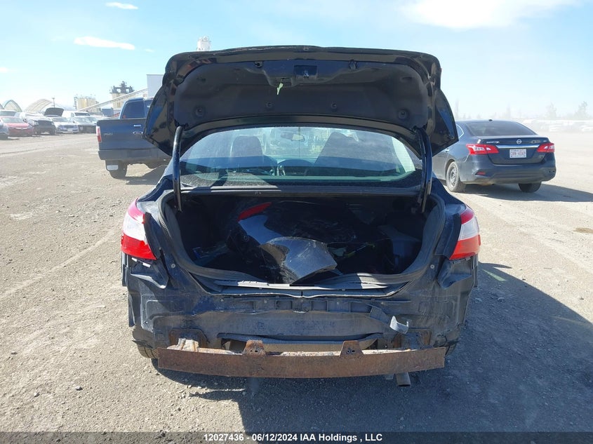 2014 Ford Focus Titanium VIN: 1FADP3J26EL242771 Lot: 12027436