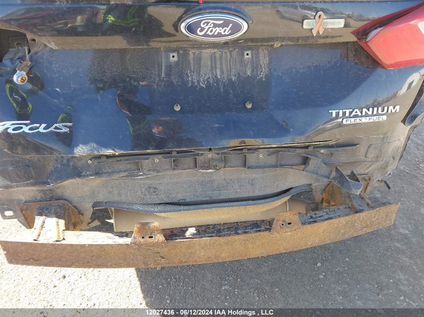 2014 Ford Focus Titanium VIN: 1FADP3J26EL242771 Lot: 12027436
