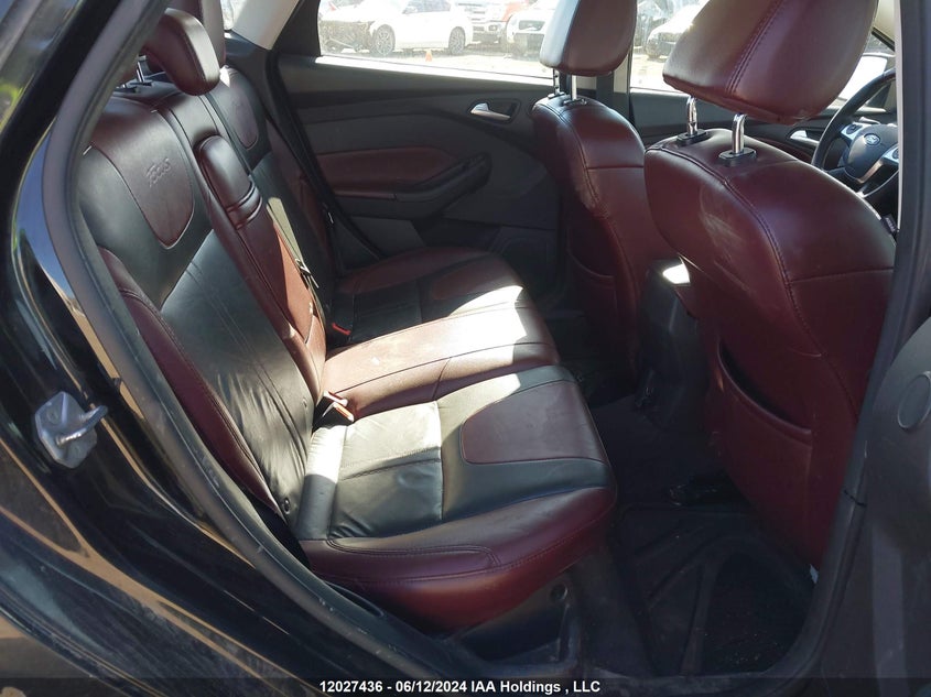 2014 Ford Focus Titanium VIN: 1FADP3J26EL242771 Lot: 12027436