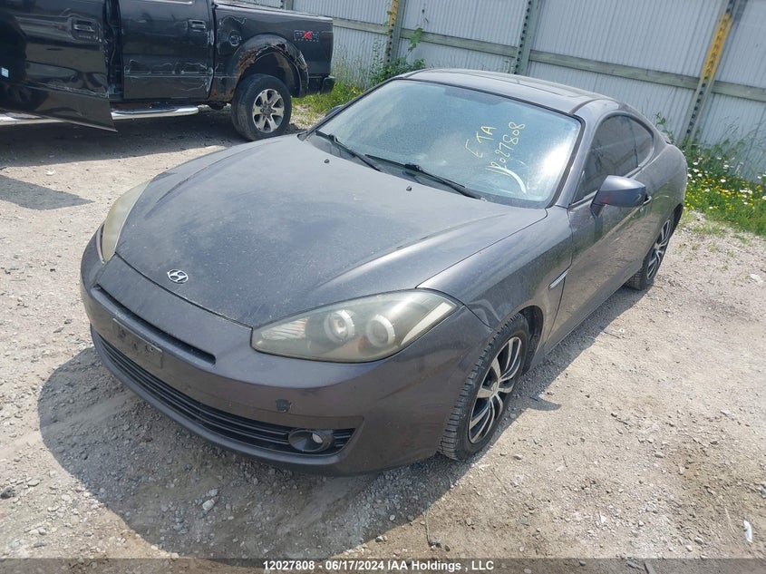 2008 Hyundai Tiburon VIN: KMHHM65D48U281337 Lot: 12027808