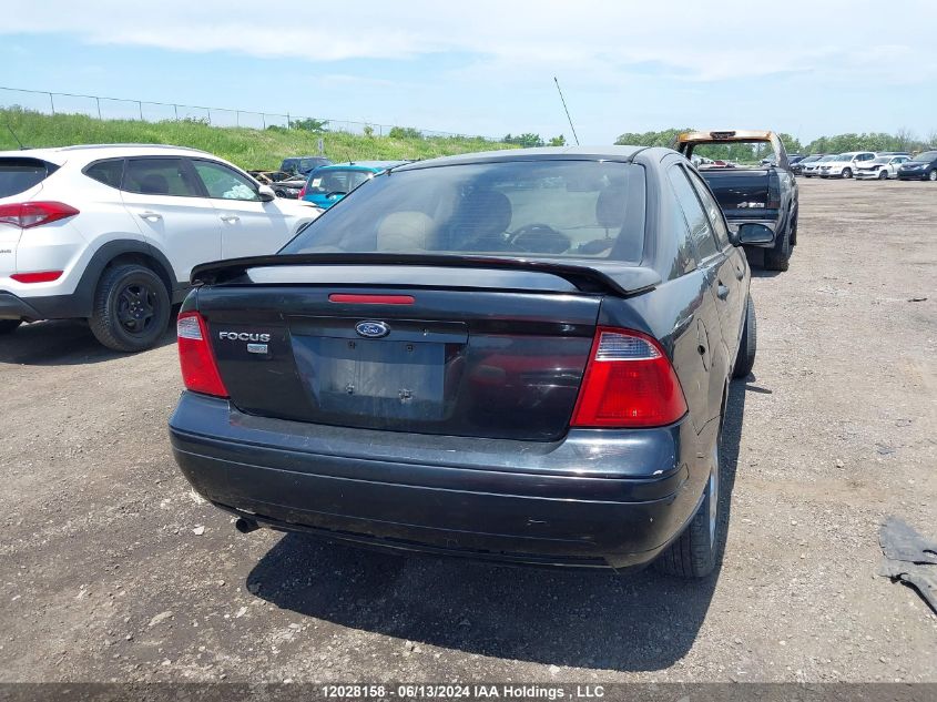 2007 Ford Focus VIN: 1FAFP34N37W147424 Lot: 12028158