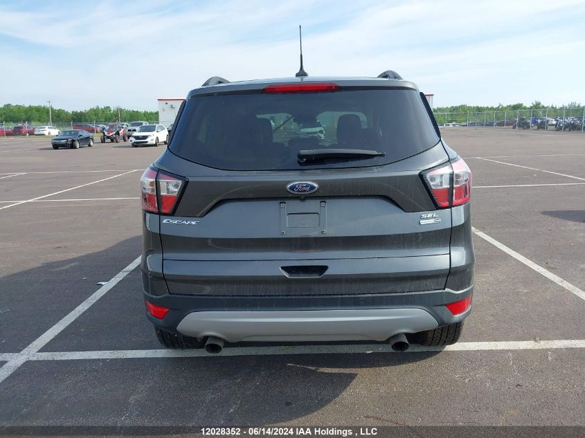 2018 Ford Escape Sel VIN: 1FMCU9HDXJUD39447 Lot: 12028352