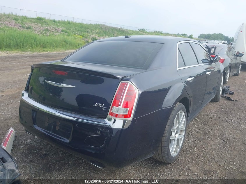 2011 Chrysler 300C VIN: 2C3CA6CTXBH572795 Lot: 12028616
