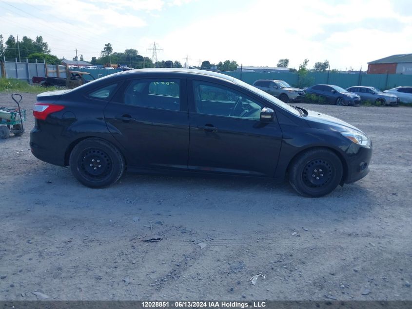 2014 Ford Focus VIN: 1FADP3F23EL256572 Lot: 12028851