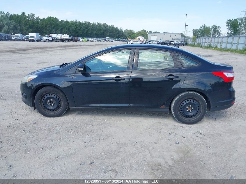 2014 Ford Focus VIN: 1FADP3F23EL256572 Lot: 12028851