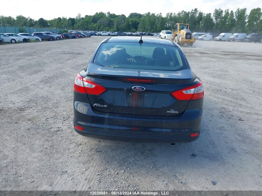 2014 Ford Focus VIN: 1FADP3F23EL256572 Lot: 12028851