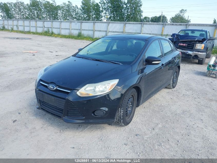 2014 Ford Focus VIN: 1FADP3F23EL256572 Lot: 12028851