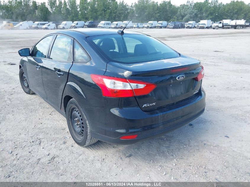 2014 Ford Focus VIN: 1FADP3F23EL256572 Lot: 12028851