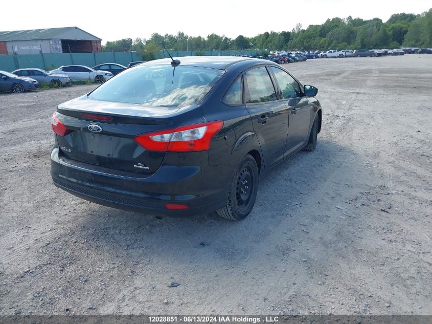 2014 Ford Focus VIN: 1FADP3F23EL256572 Lot: 12028851