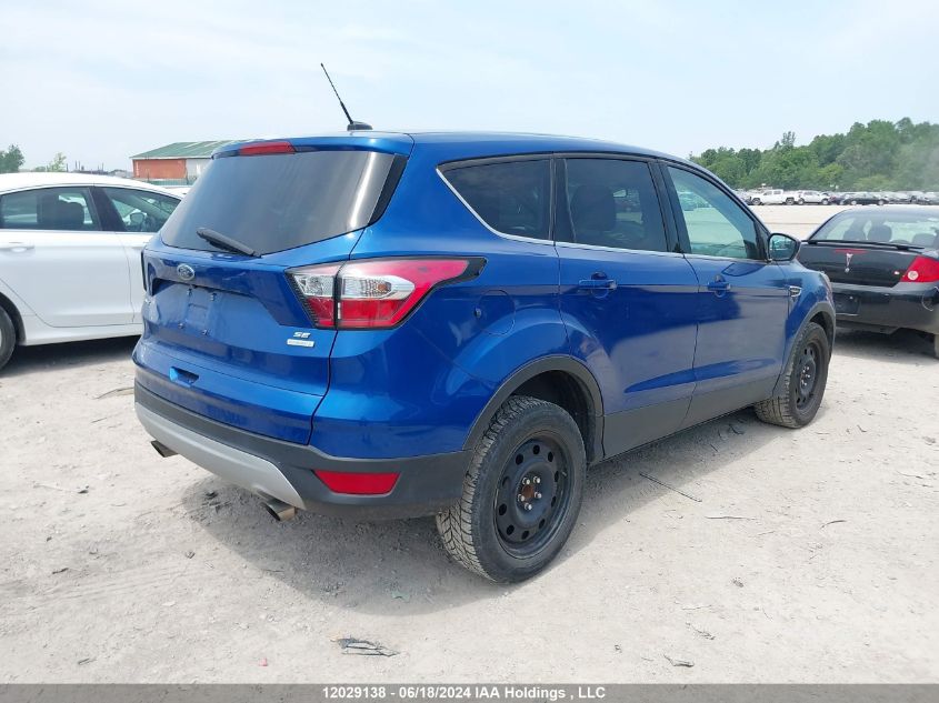 2017 Ford Escape Se VIN: 1FMCU0GDXHUE58705 Lot: 12029138