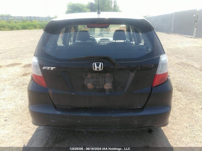 2009 Honda Fit VIN: JHMGE88559S811307 Lot: 12029306