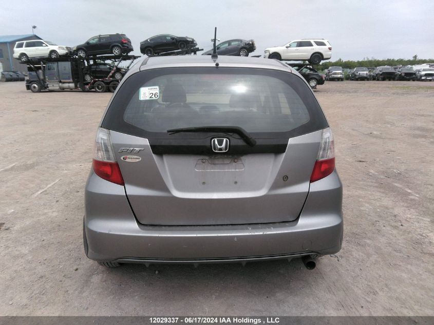 2009 Honda Fit VIN: JHMGE87259S813081 Lot: 12029337