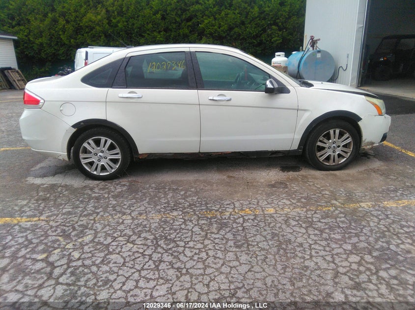 2011 Ford Focus VIN: 1FAHP3HN7BW122991 Lot: 12029346