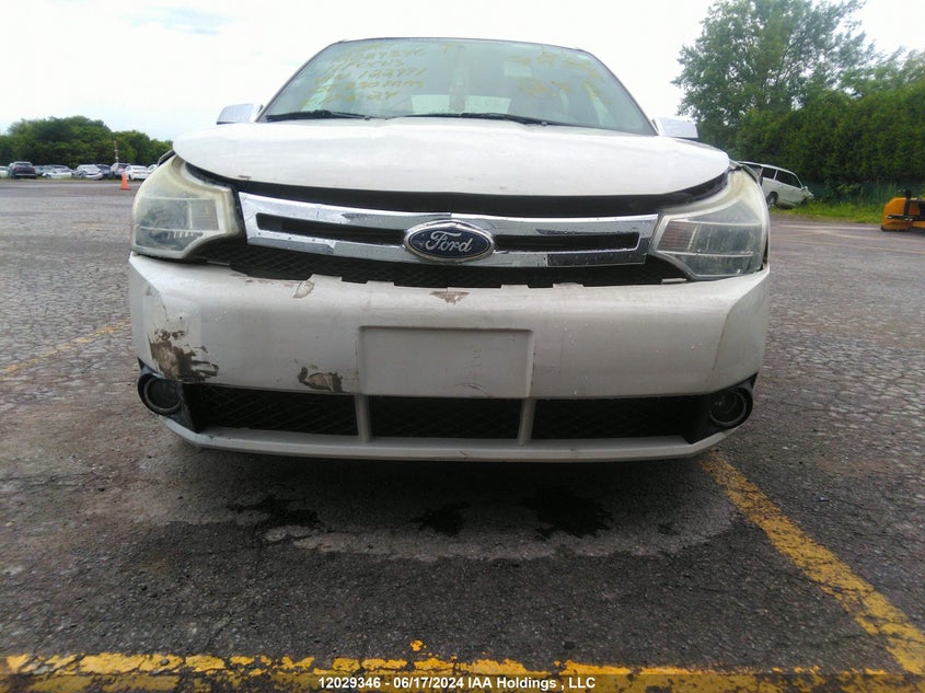 2011 Ford Focus VIN: 1FAHP3HN7BW122991 Lot: 12029346