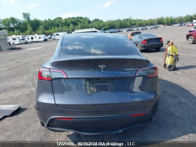 2023 Tesla Model Y VIN: LRWYGDFD3PC057802 Lot: 12029400