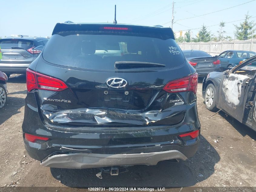 2018 Hyundai Santa Fe Sport 2.4 Base VIN: 5XYZTDLB9JG521782 Lot: 12029731