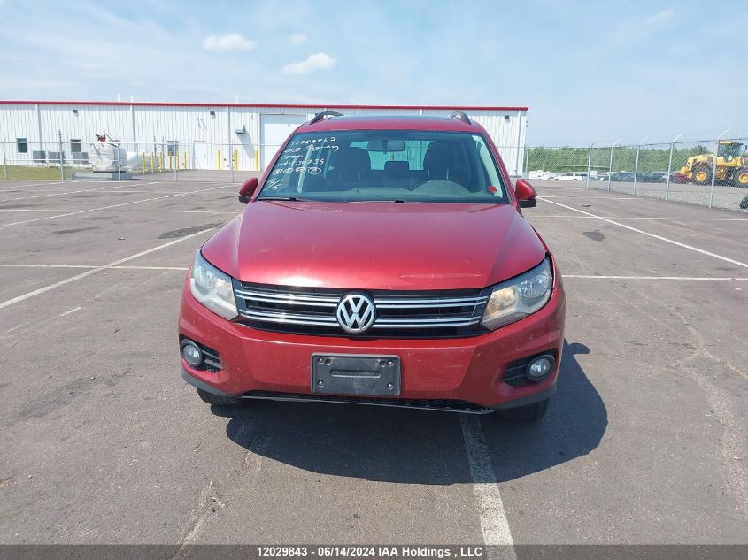 2015 Volkswagen Tiguan VIN: WVGJV7AX1FW030734 Lot: 12029843