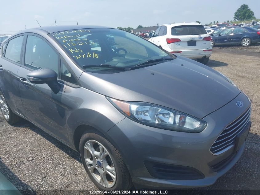 2014 Ford Fiesta VIN: 3FADP4EJ2EM113013 Lot: 12029964