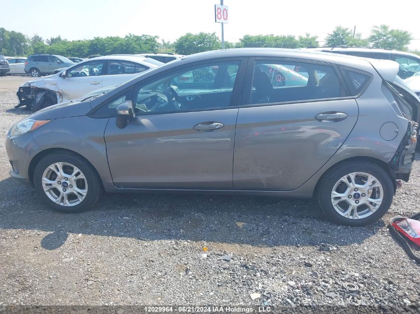 2014 Ford Fiesta VIN: 3FADP4EJ2EM113013 Lot: 12029964