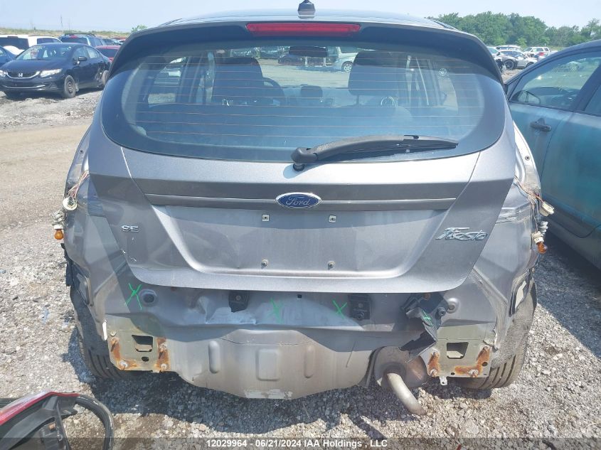 2014 Ford Fiesta VIN: 3FADP4EJ2EM113013 Lot: 12029964