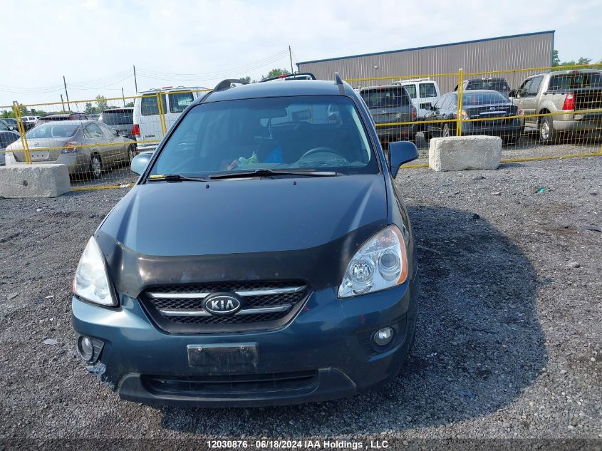 2009 Kia Rondo VIN: KNAFG526997251038 Lot: 12030876