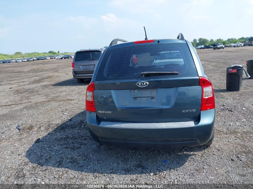 2009 Kia Rondo VIN: KNAFG526997251038 Lot: 12030876