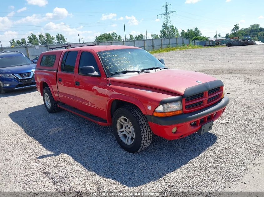 2002 Dodge Dakota VIN: 1B7HL38NX2S699656 Lot: 12031881