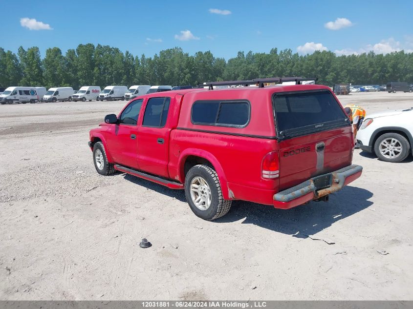 2002 Dodge Dakota VIN: 1B7HL38NX2S699656 Lot: 12031881