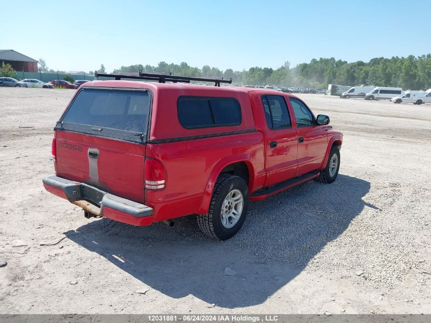 2002 Dodge Dakota VIN: 1B7HL38NX2S699656 Lot: 12031881