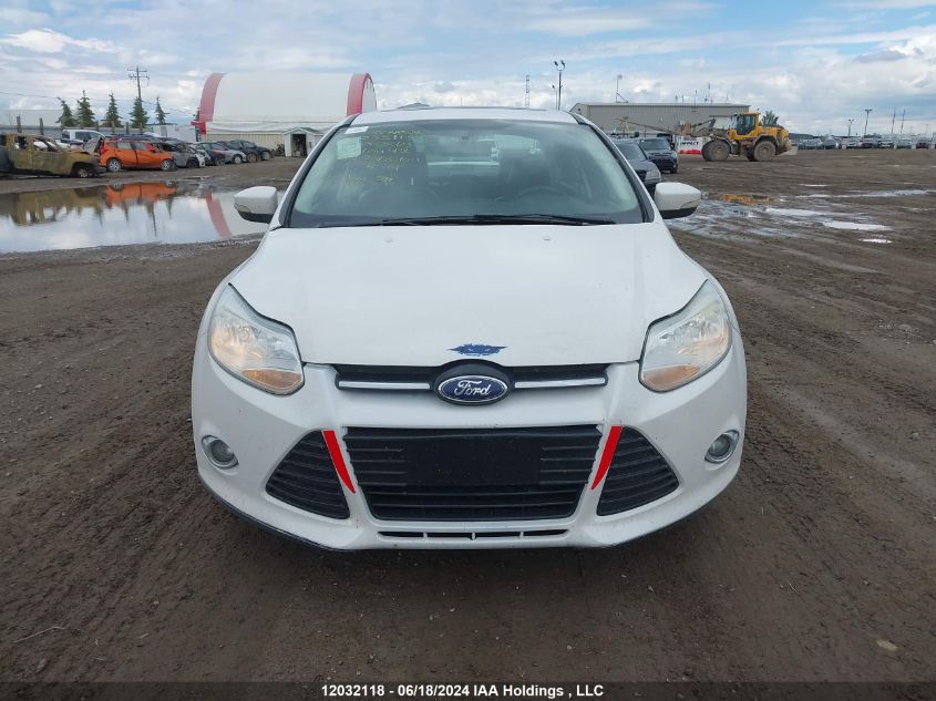 2013 Ford Focus Titanium VIN: 1FADP3J20DL310092 Lot: 12032118