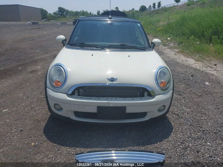 2010 Mini Cooper VIN: WMWMR3C54ATU98703 Lot: 12032261