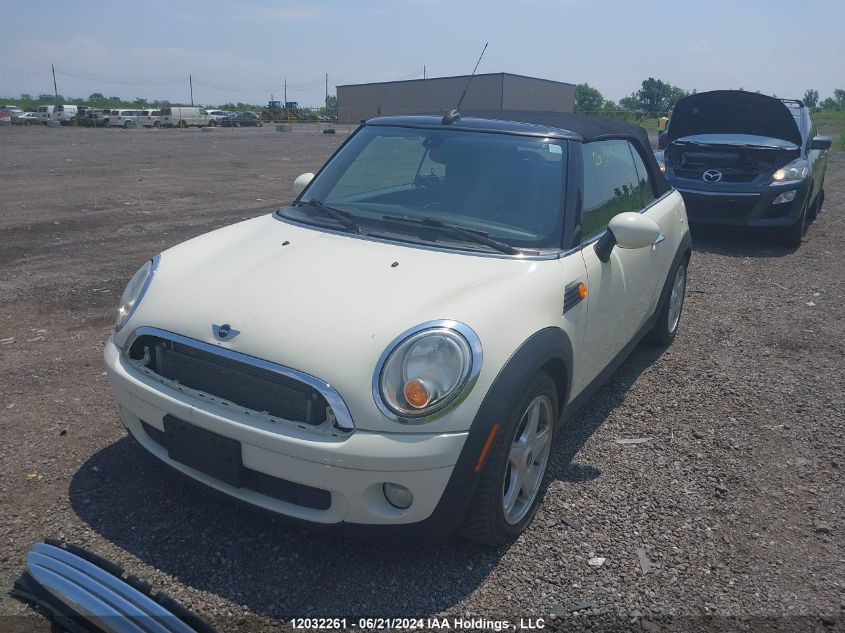 2010 Mini Cooper VIN: WMWMR3C54ATU98703 Lot: 12032261