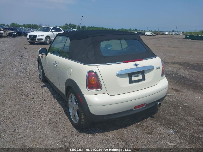 2010 Mini Cooper VIN: WMWMR3C54ATU98703 Lot: 12032261