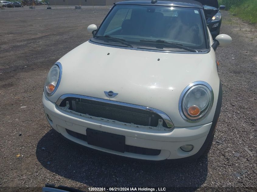 2010 Mini Cooper VIN: WMWMR3C54ATU98703 Lot: 12032261