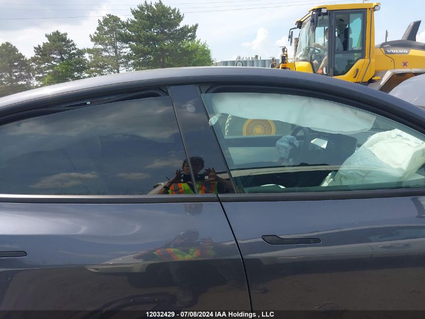 2022 Tesla Model Y VIN: 7SAYGDEF7NF512398 Lot: 12032429