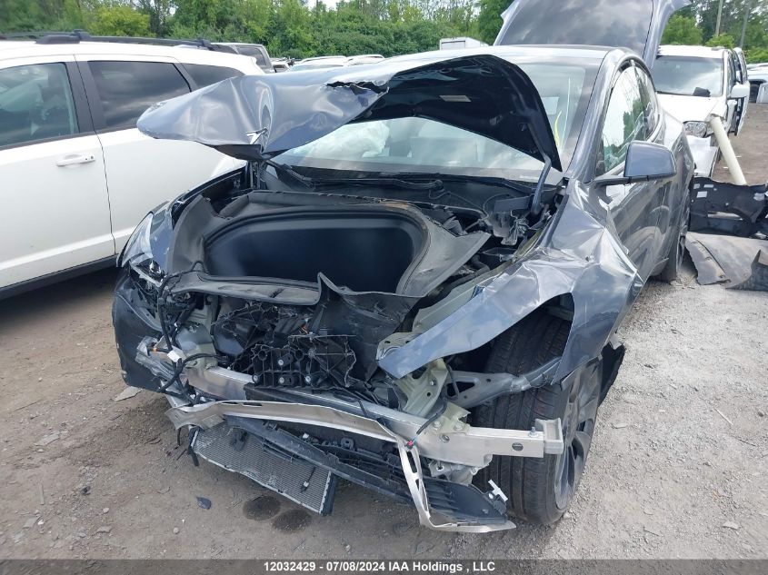 2022 Tesla Model Y VIN: 7SAYGDEF7NF512398 Lot: 12032429