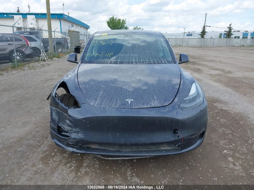 2023 Tesla Model Y VIN: 7SAYGDEE0PF672648 Lot: 12032568