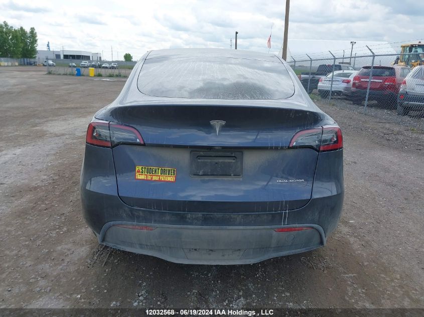 2023 Tesla Model Y VIN: 7SAYGDEE0PF672648 Lot: 12032568