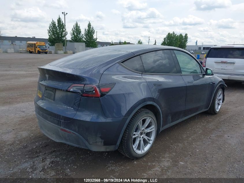 2023 Tesla Model Y VIN: 7SAYGDEE0PF672648 Lot: 12032568