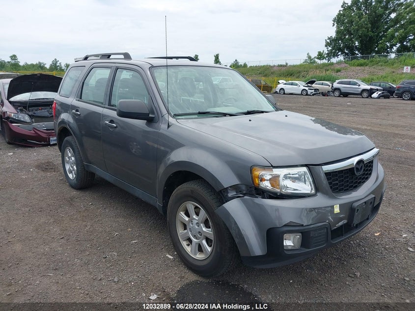 2011 Mazda Tribute I VIN: 4F2CY0C75BKM04188 Lot: 12032889