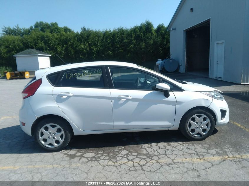 2012 Ford Fiesta VIN: 3FADP4EJ9CM151853 Lot: 12033177