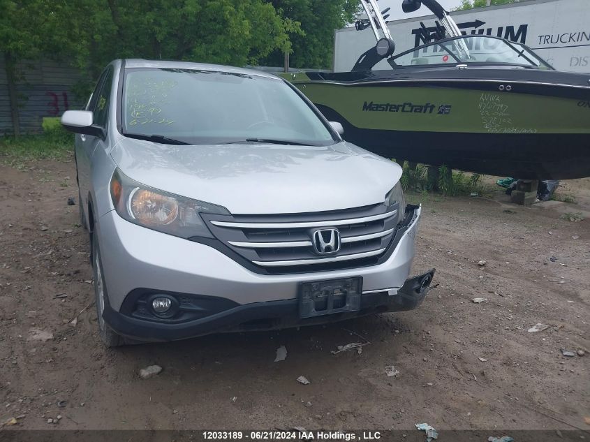 2014 Honda Cr-V VIN: 2HKRM3H56EH002083 Lot: 12033189