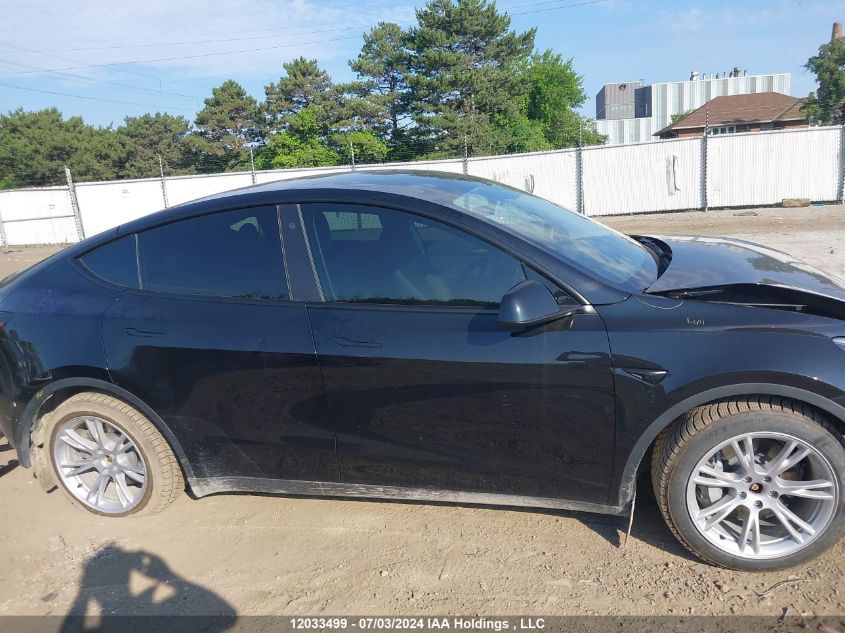 2023 Tesla Model Y VIN: LRWYGDEE1PC267003 Lot: 12033499