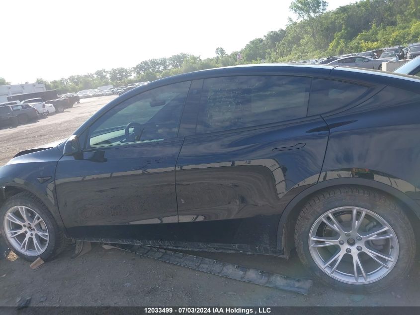 2023 Tesla Model Y VIN: LRWYGDEE1PC267003 Lot: 12033499