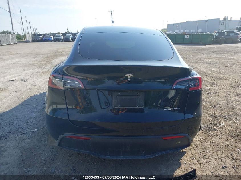 2023 Tesla Model Y VIN: LRWYGDEE1PC267003 Lot: 12033499
