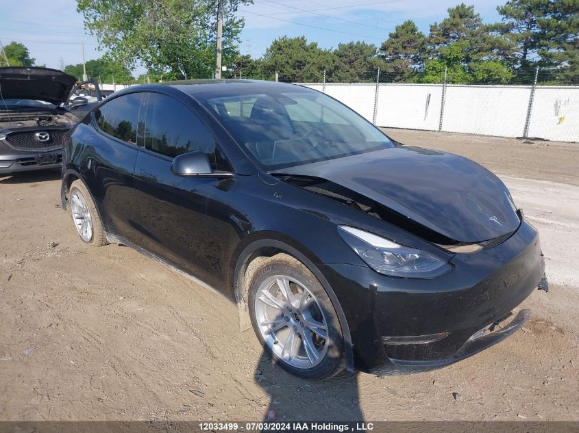 2023 Tesla Model Y VIN: LRWYGDEE1PC267003 Lot: 12033499